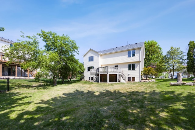 640 Falcon Ridge Rd, Woodbury, MN 55125 - rear view of house with stairway and a wooden deck