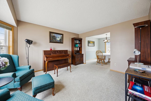 640 Falcon Ridge Rd, Woodbury, MN 55125 - living room with carpet flooring, a chandelier, a textured ceiling, and baseboards