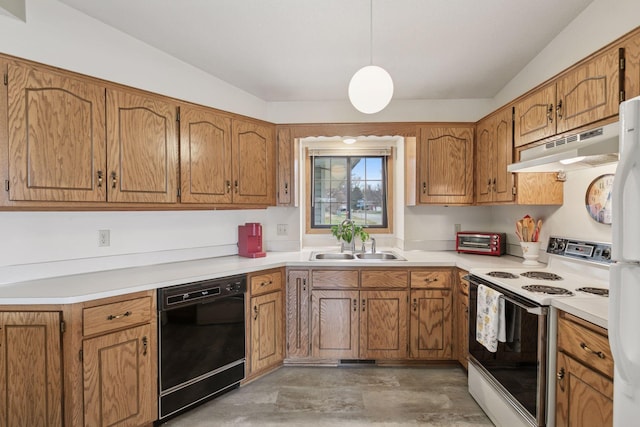 kitchen with a sink, brown cabinetry, white appliances, light countertops, and under cabinet range hood
