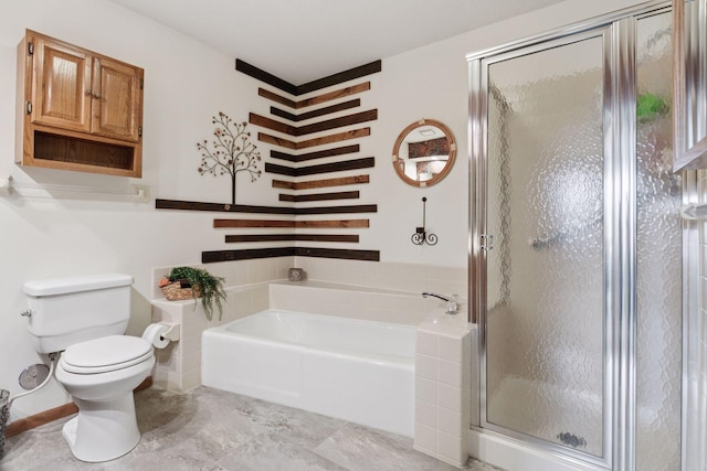 bathroom featuring a shower stall, toilet, and a garden tub