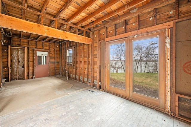 miscellaneous room with a water view and a wealth of natural light