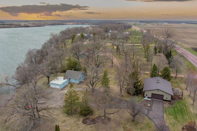 drone / aerial view with a water view