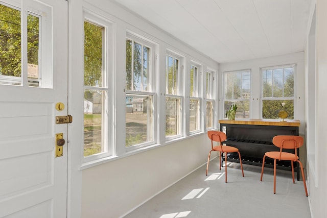 2822 29th St, Minneapolis, MN 55406 - sunroom with plenty of natural light, baseboards, and carpet floors