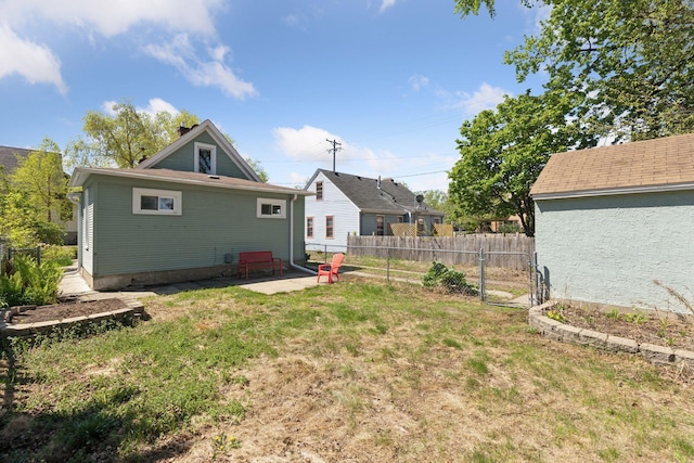 2822 29th St, Minneapolis, MN 55406 - back of property with a patio and a gate