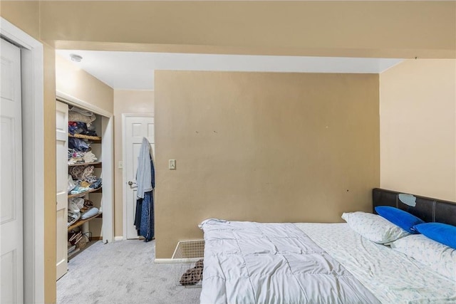 2411 Mcmenemy St, Little Canada, MN 55117 - bedroom with visible vents, baseboards, a closet, and carpet