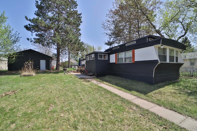 513 5th Ave, Ironton, MN 56455 - view of side of home with a patio