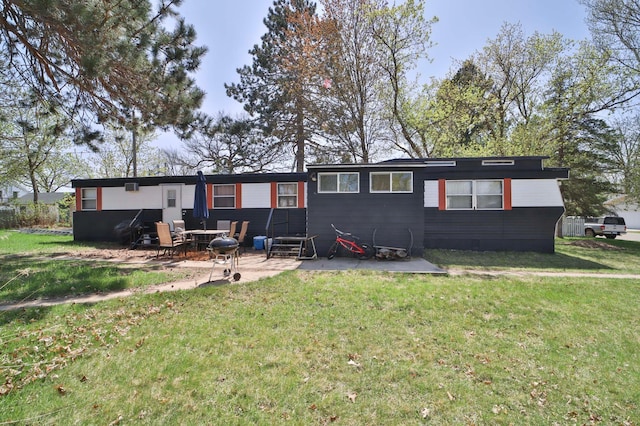 513 5th Ave, Ironton, MN 56455 - rear view of property featuring a lawn, a patio area, and entry steps