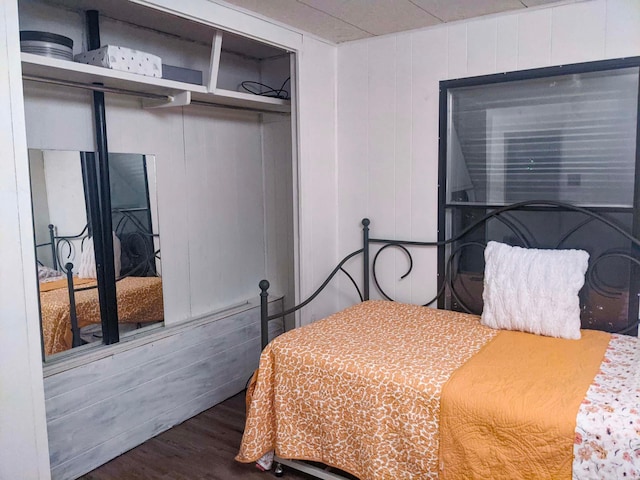 513 5th Ave, Ironton, MN 56455 - bedroom featuring wood finished floors and a closet