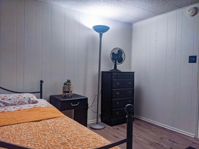 513 5th Ave, Ironton, MN 56455 - bedroom featuring wood finished floors and baseboards