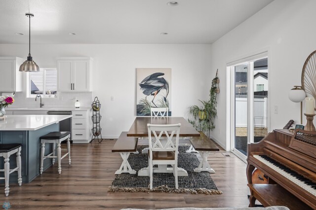 5497 11th St W, West Fargo, ND 58078 - dining room featuring dark wood finished floors and baseboards