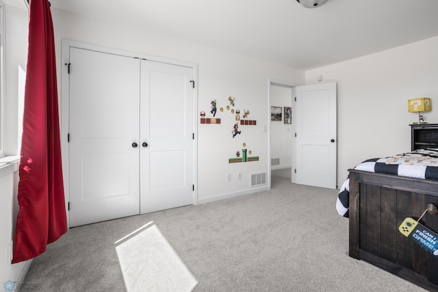 5497 11th St W, West Fargo, ND 58078 - bedroom featuring baseboards, a closet, visible vents, and carpet