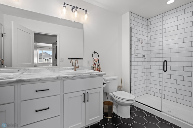 5497 11th St W, West Fargo, ND 58078 - bathroom with double vanity, a shower stall, toilet, and a sink