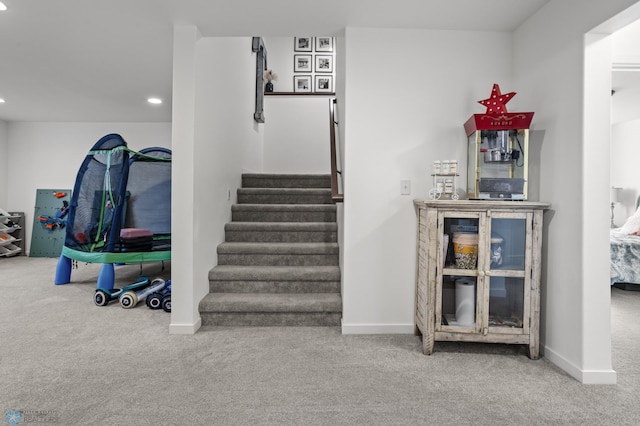 5497 11th St W, West Fargo, ND 58078 - stairway featuring recessed lighting, carpet flooring, and baseboards