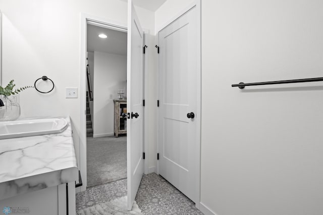 5497 11th St W, West Fargo, ND 58078 - bathroom with recessed lighting, vanity, and baseboards