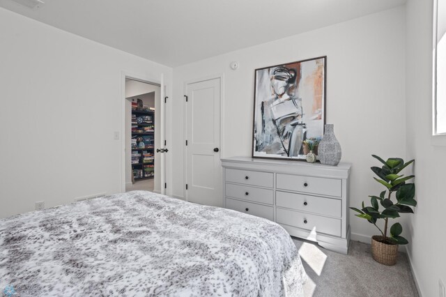 5497 11th St W, West Fargo, ND 58078 - carpeted bedroom featuring visible vents and baseboards