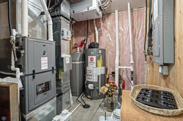 5497 11th St W, West Fargo, ND 58078 - utility room featuring electric panel and gas water heater