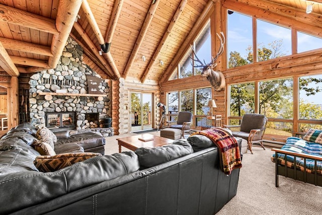 10001 Tomahawk Ln, Ray, MN 56669 - living room featuring high vaulted ceiling, wood ceiling, a fireplace, carpet flooring, and beam ceiling