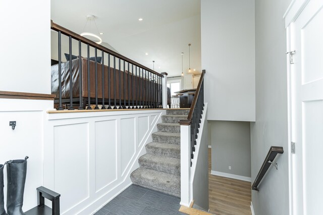 4594 Buckingham Dr NW, Rochester, MN 55901 - stairway featuring recessed lighting and baseboards