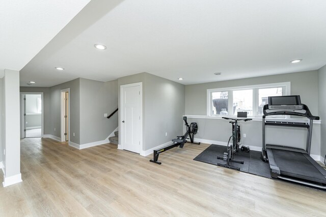 4594 Buckingham Dr NW, Rochester, MN 55901 - exercise area featuring baseboards, wood finished floors, and recessed lighting