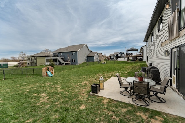 4594 Buckingham Dr NW, Rochester, MN 55901 - view of yard with a residential view, a patio area, and a playground