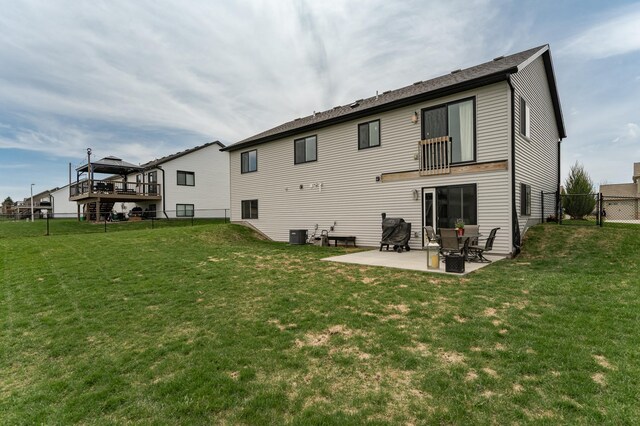 4594 Buckingham Dr NW, Rochester, MN 55901 - rear view of house featuring a patio area and central AC unit