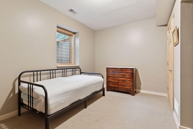 1584 Merrill St, Saint Paul, MN 55108 - bedroom featuring a textured ceiling and carpet