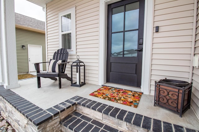 8825 Meadowlark Pkwy, Horace, ND 58047 - view of exterior entry with a porch
