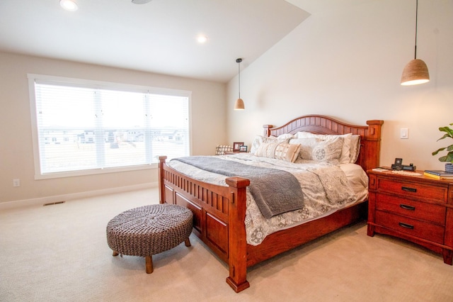 8825 Meadowlark Pkwy, Horace, ND 58047 - bedroom featuring light colored carpet, vaulted ceiling, visible vents, and recessed lighting