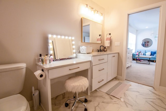 8825 Meadowlark Pkwy, Horace, ND 58047 - bathroom with vanity, marble finish floor, and toilet