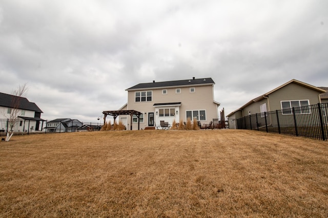 8825 Meadowlark Pkwy, Horace, ND 58047 - back of house featuring fence, a lawn, and a pergola