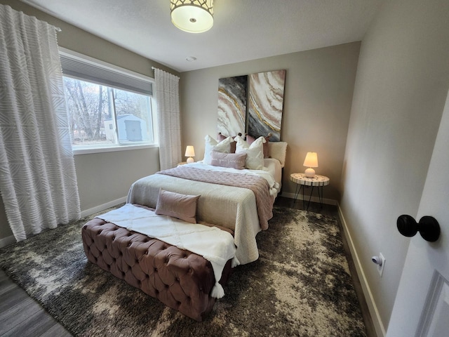 bedroom with baseboards