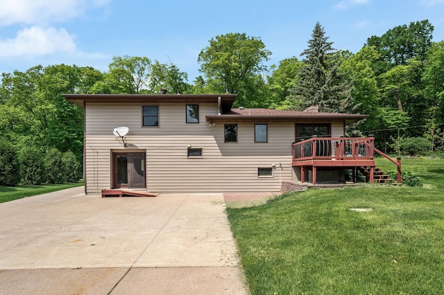 2235 Chestnut Rd, Medina, MN 55340 - back of property featuring a wooden deck, a yard, and a patio area