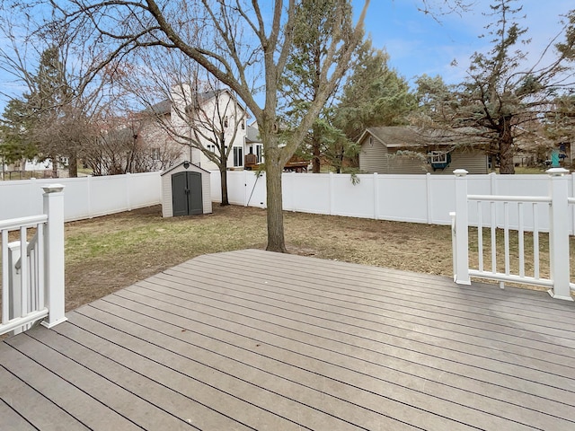 7426 Chesham Ln, Woodbury, MN 55125 - wooden terrace with a storage shed, a fenced backyard, and an outdoor structure