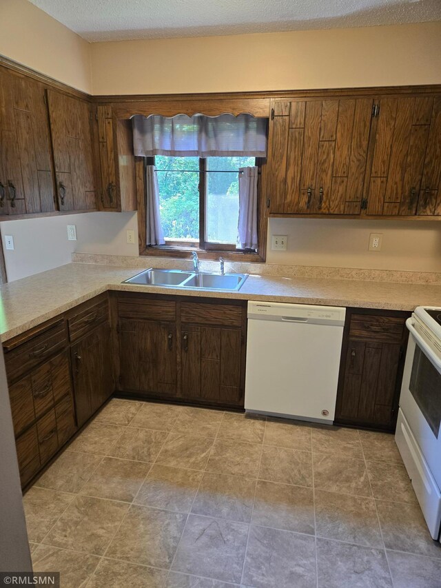 5401 70th Cir N, Brooklyn Center, MN 55429 - kitchen featuring white appliances and light countertops