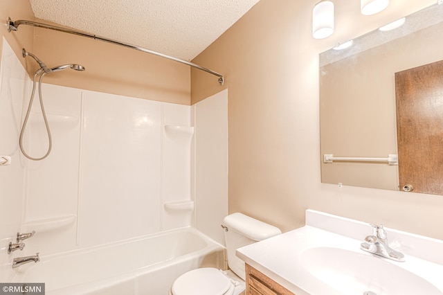 5401 70th Cir N, Brooklyn Center, MN 55429 - bathroom featuring a textured ceiling, vanity, and shower / tub combination