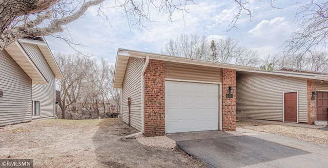 5401 70th Cir N, Brooklyn Center, MN 55429 - garage with driveway