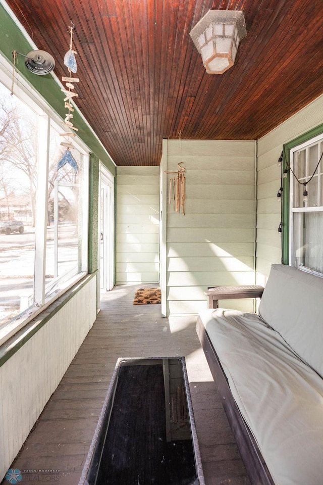 sunroom featuring a wealth of natural light