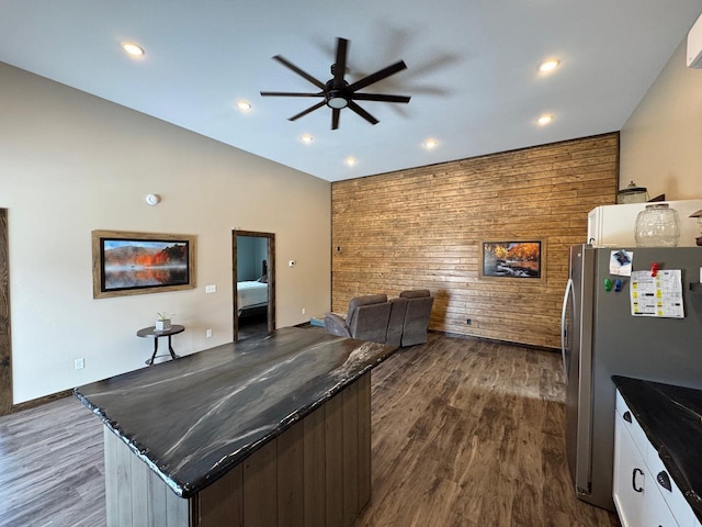 504 Lakin Ave NW, Kelliher, MN 56650 - kitchen with ceiling fan, a center island, freestanding refrigerator, dark wood-style floors, and recessed lighting