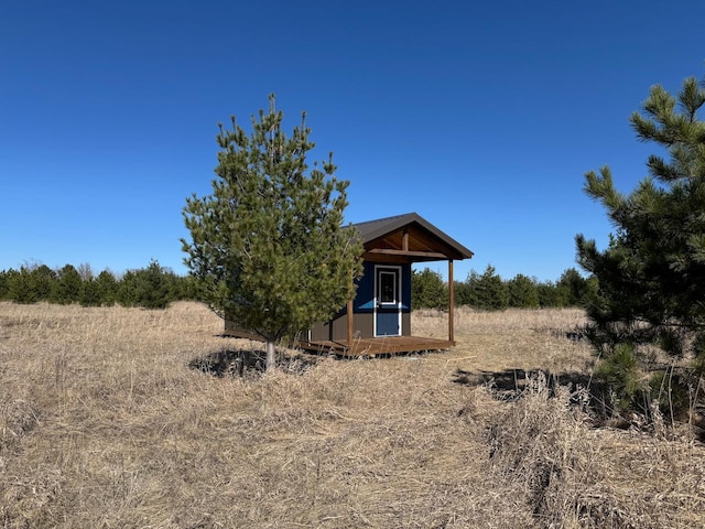 exterior space featuring an outdoor structure