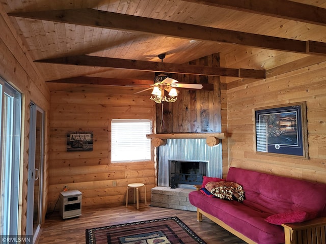 12972 Big Kandi Dr, Lake Lillian, MN 56253 - living room featuring wood walls, vaulted ceiling with beams, wood finished floors, and wooden ceiling