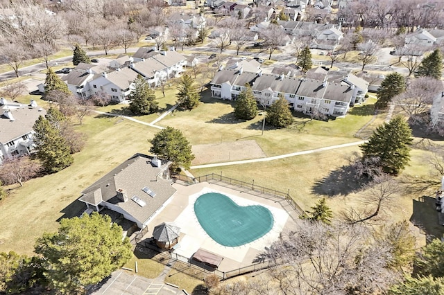 birds eye view of property with a residential view