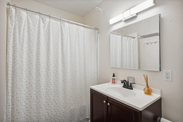 bathroom with vanity and a shower with curtain