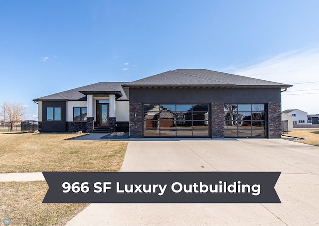 exterior space featuring a yard, stucco siding, driveway, roof with shingles, and a garage