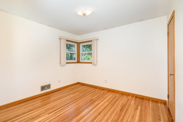 4926 Madison St NE, Columbia Heights, MN 55421 - empty room featuring baseboards and light wood-type flooring