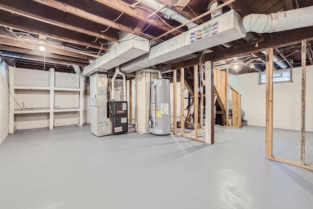 basement featuring gas water heater, heating unit, and stairway