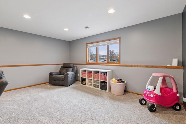 recreation room with carpet, baseboards, and recessed lighting