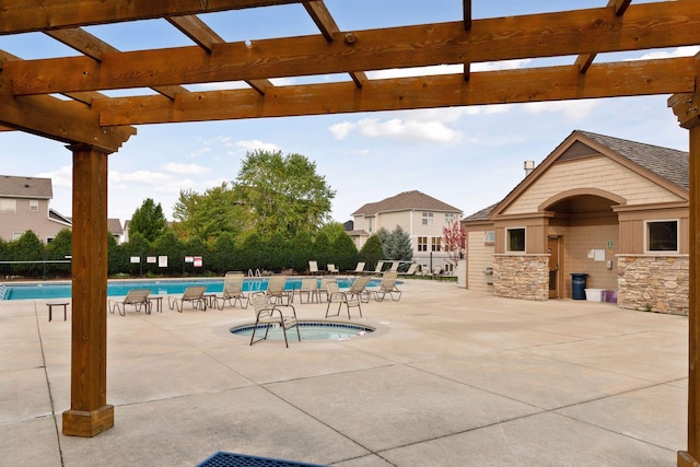 view of patio / terrace featuring a pergola and a community pool