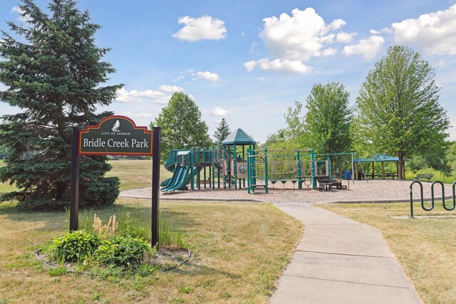 community play area featuring a yard