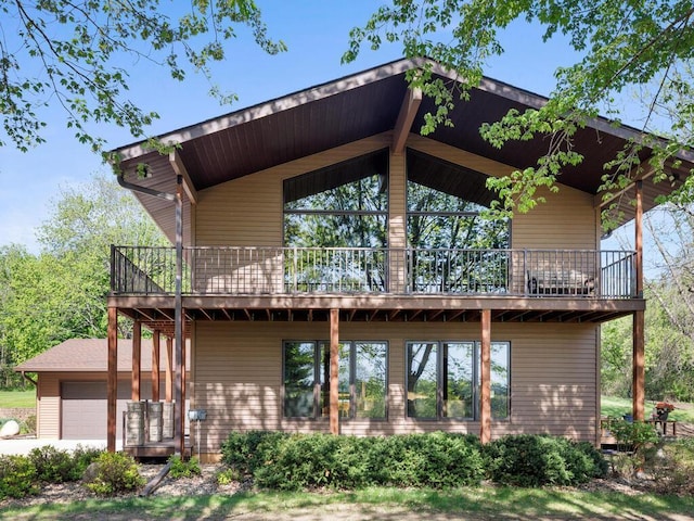 21420 Saint Croix Trl N, Scandia, MN 55073 - back of house featuring a garage and a balcony