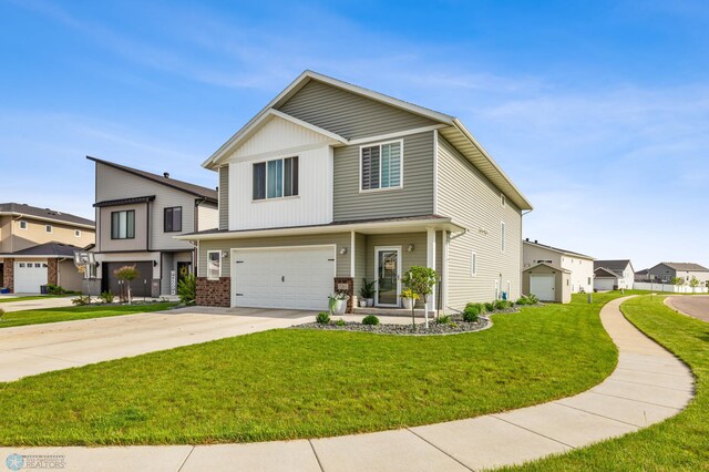 craftsman inspired home with brick siding, driveway, an attached garage, and a front lawn